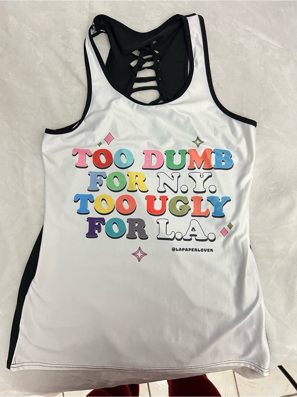 White Graphic Racerback Tank — "Too Dumb for N.Y., Too Ugly for L.A."